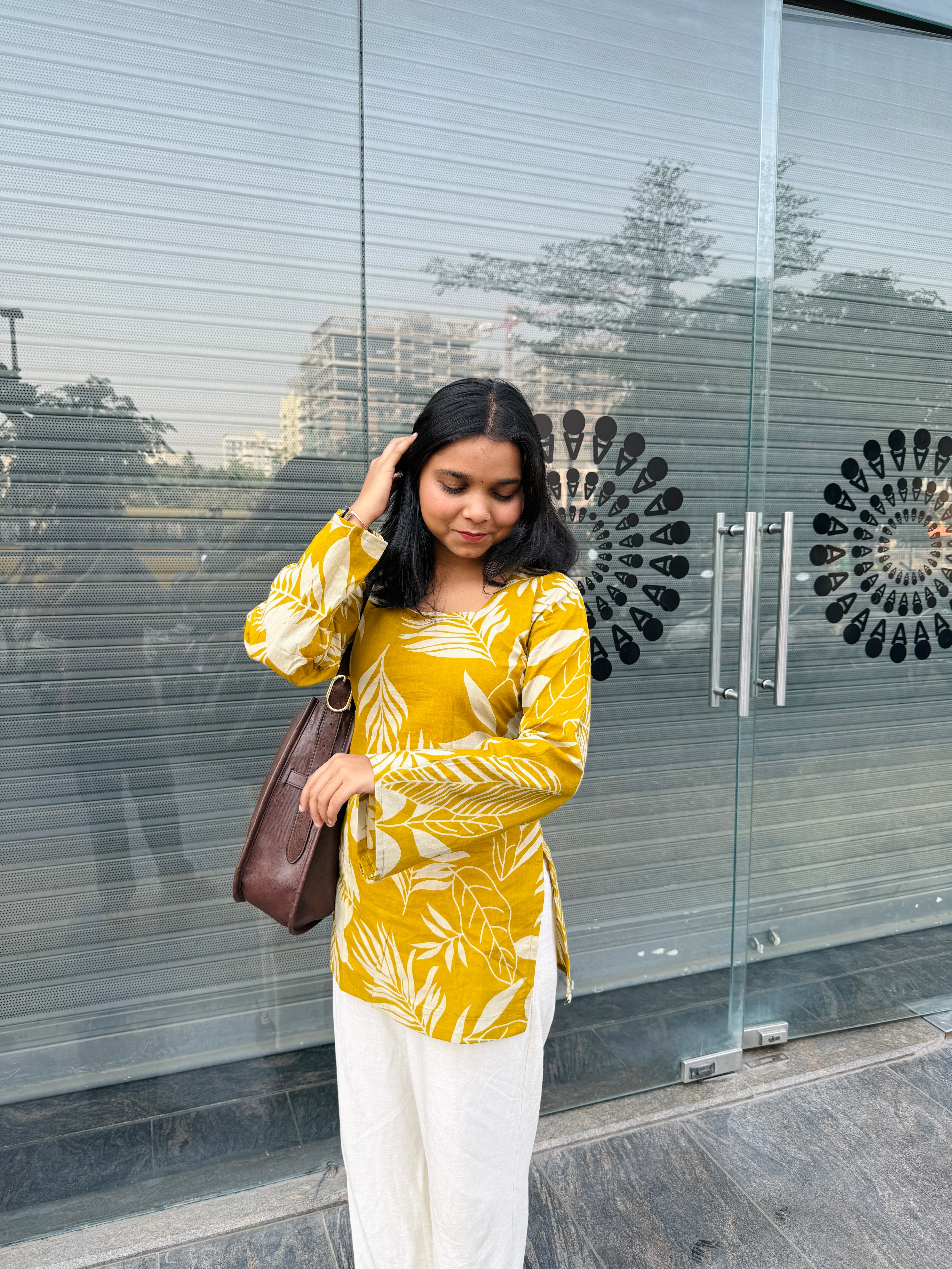 Saanvi Printed Yellow Kurti